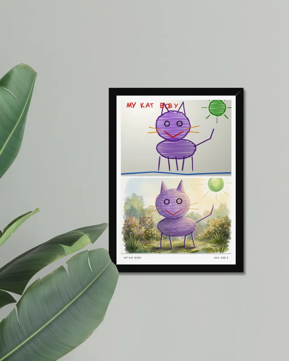 The purple cat drawing and its storybook painting, framed A3 in black, on a sage-green living room wall beside a large plant